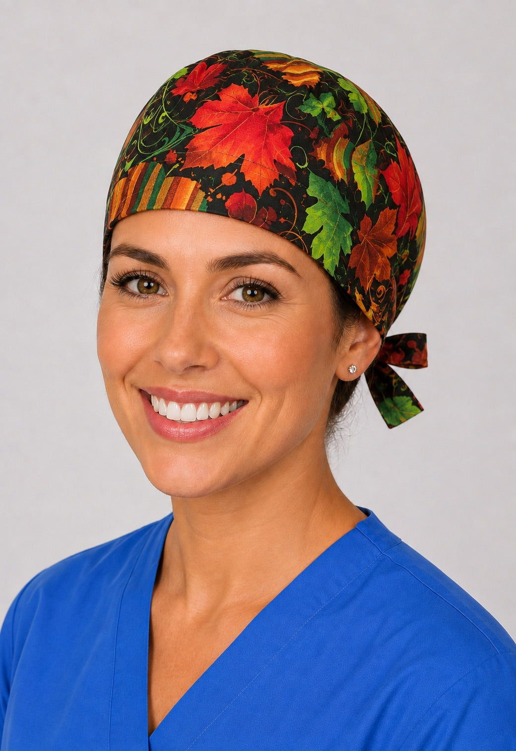 Three-quarter view of autumn foliage maple leaf unisex adjustable surgical hat for nurses and surgical techs