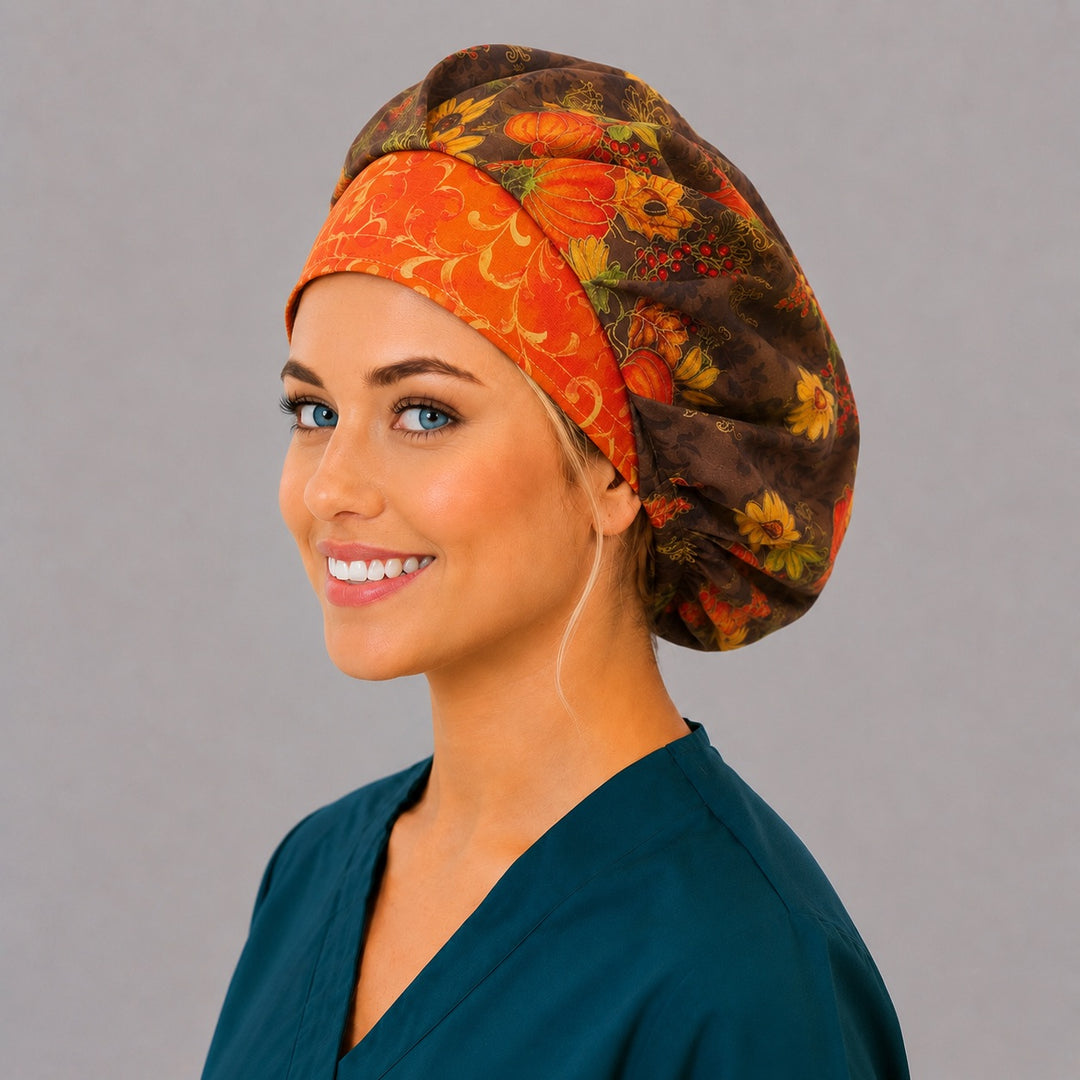 Autumn harvest bouffant cap for women, left angled smiling view — handmade fall floral surgical cap, USA made