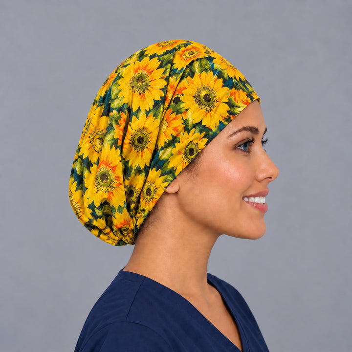 Right side profile of the autumn sunflower Euro surgical hat — seeded centers and burnt orange accents, breathable cotton cap