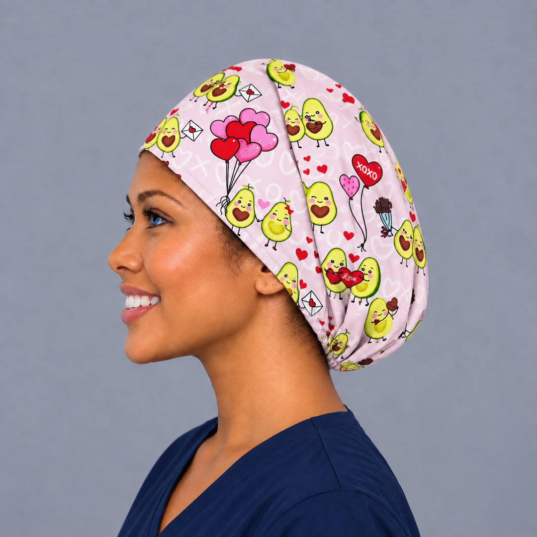 Avo My Heart Euro surgical hat, right angled smiling view — handmade avocado and XOXO balloon print cap, USA made
