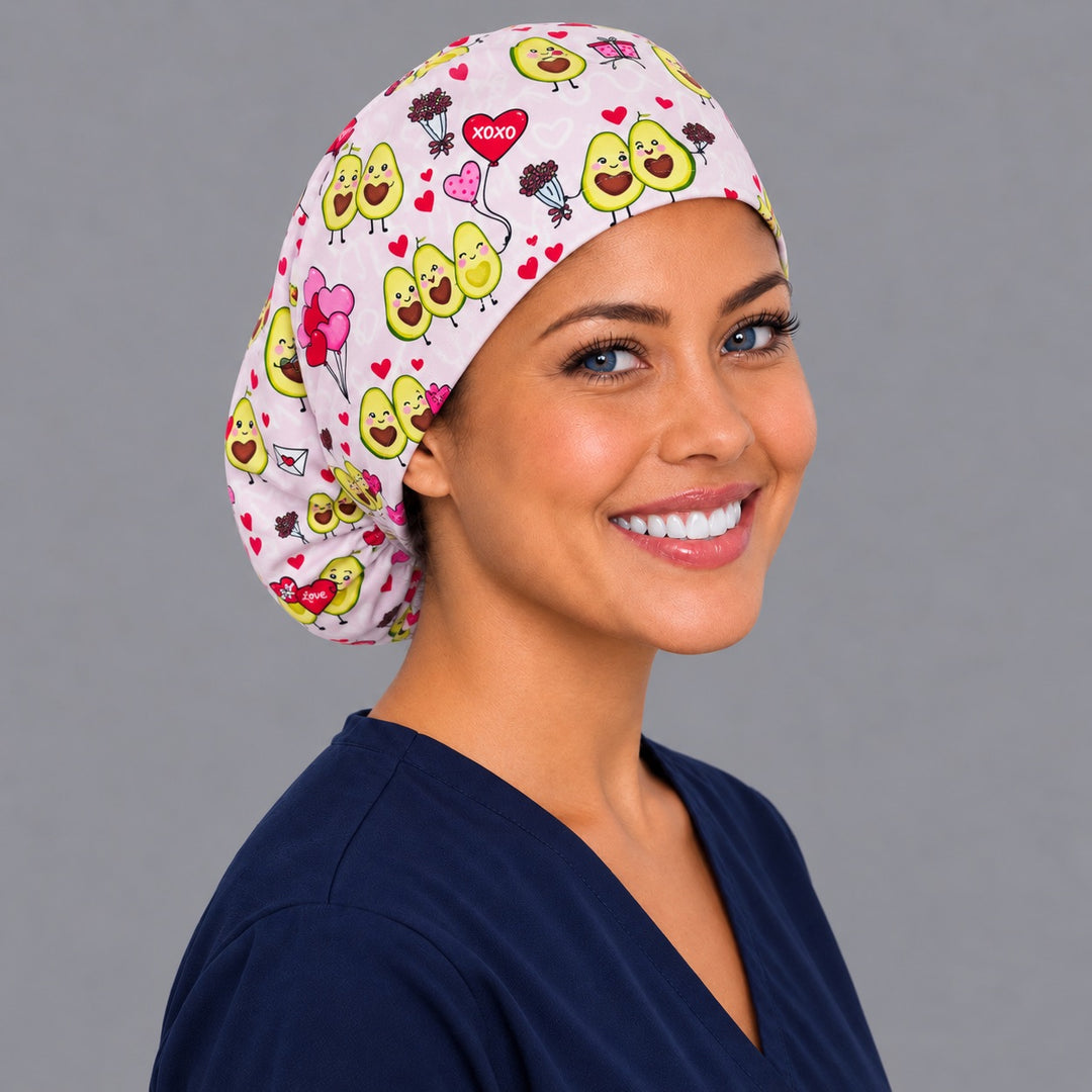 Back view of the Avocado Love Euro scrub cap — elastic gathered back showing avocado couples across the pink crown