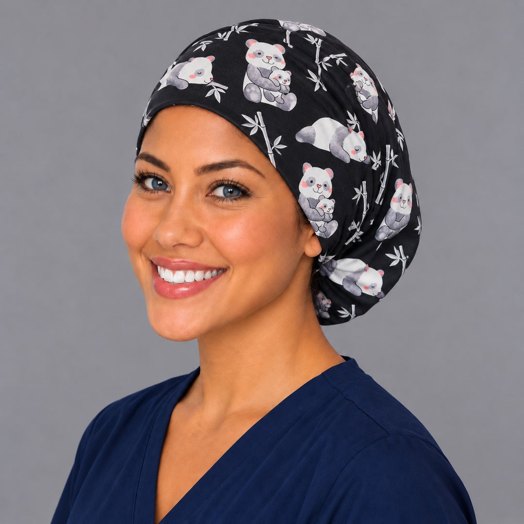 Baby panda Euro scrub cap, left angled smiling view — mama and cub print for OR nurses and vet techs