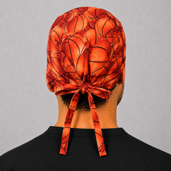 Back view of adjustable tie-back knot on orange basketball sports scrub cap surgical hat