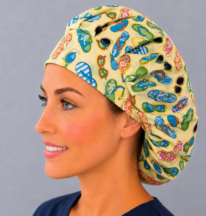 Beach sandal bouffant surgical cap, left angled view — bright summer print for OR nurses and surgical techs