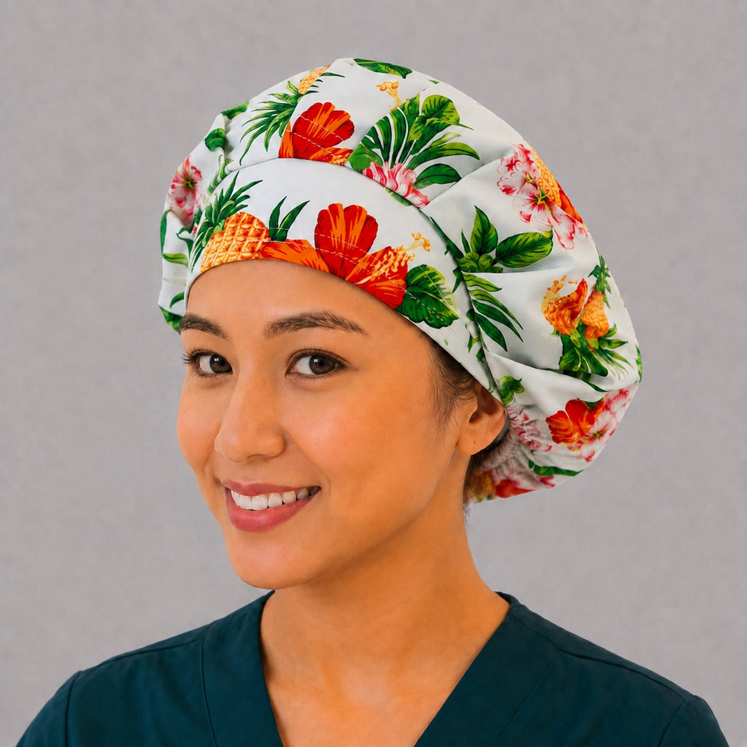 Beach vacation pineapple bouffant cap for women, right angled view — handmade tropical floral surgical cap, USA made