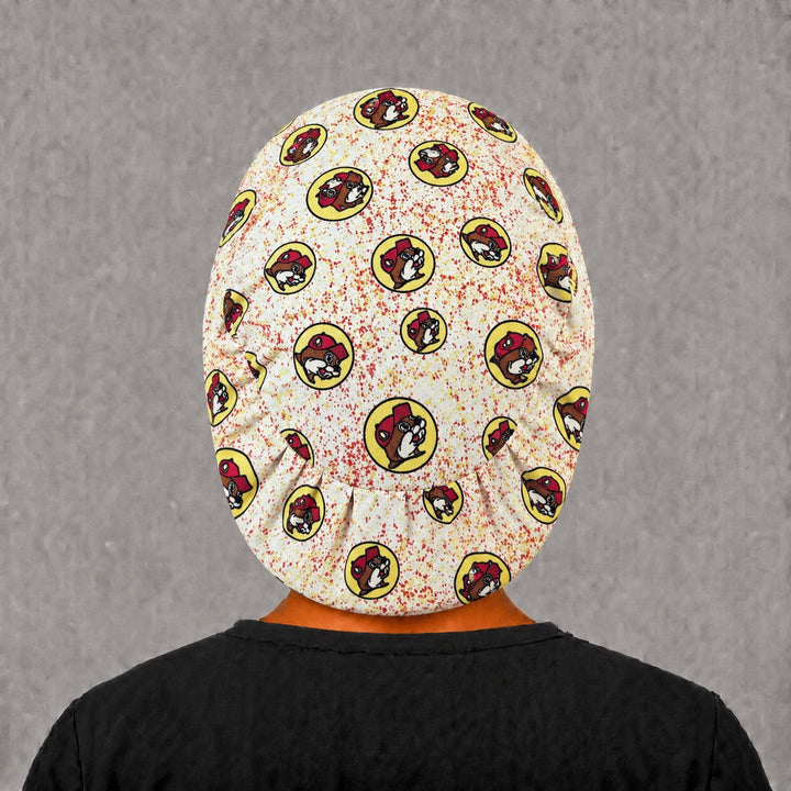 Back view of the beaver print Euro scrub cap — full coverage showing yellow beaver badges across the speckled crown