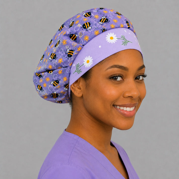 Profile view of the bee and daisy bouffant surgical hat — spring lavender honeybee print, a cheerful gift for nurses and surgical techs