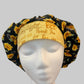 Profile view of Bee Grateful sunflower bouffant scrub cap — handmade-in-USA surgical hat, cheerful gift for nurses & sunflower lovers.