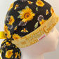 Side view of Bee Grateful sunflower bee ponytail scrub cap with back pouch & bow — handmade USA surgical hat for OR nurses with long hair.
