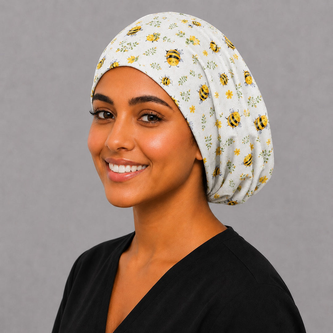Bee Happy Blooms honeybee Euro scrub cap, angled view on a model — handmade-in-USA surgical hat for women and OR nurses from OR World.
