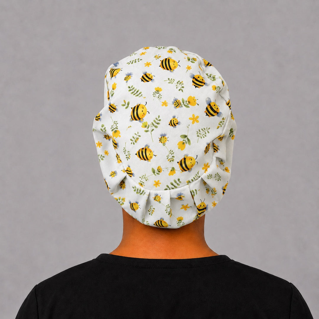 Back view of Bee Happy Blooms honeybee Euro scrub cap with elastic toggle fit — handmade-in-USA OR World surgical hat for women.