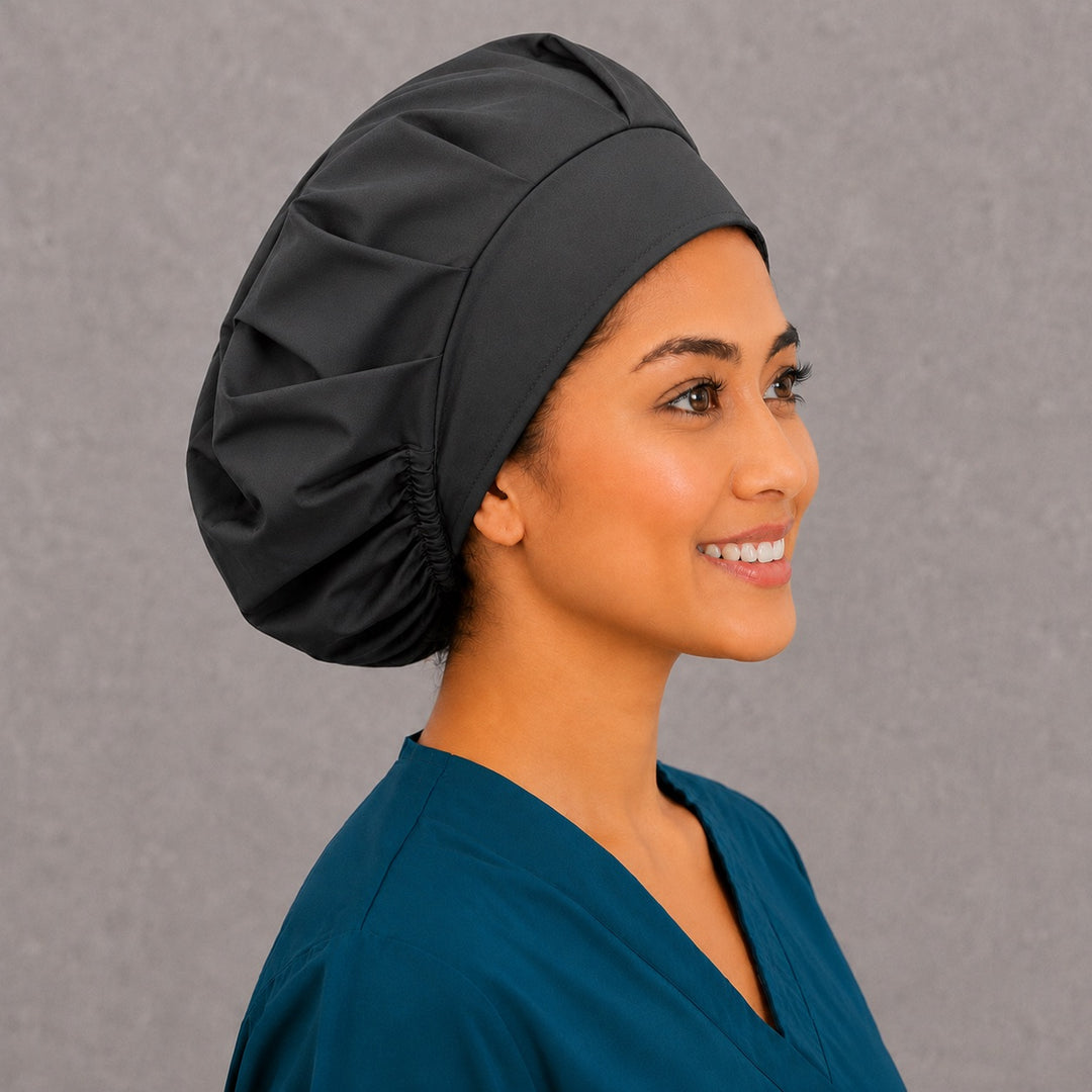 Black bouffant surgical cap for long hair, right side profile — deep gathered fit that secures buns, braids and ponytails