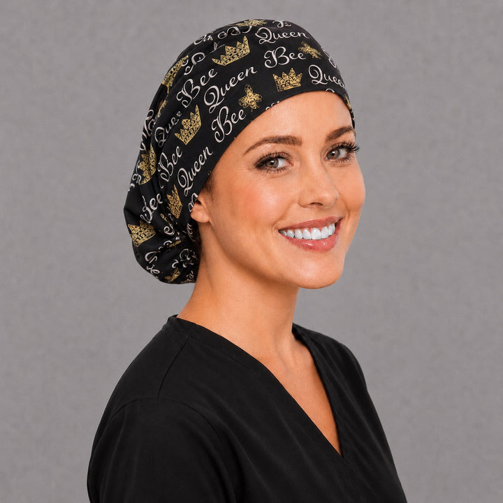 Black and gold bee Euro scrub cap, right angled smiling view — elegant honeybee print for surgical techs and vet teams