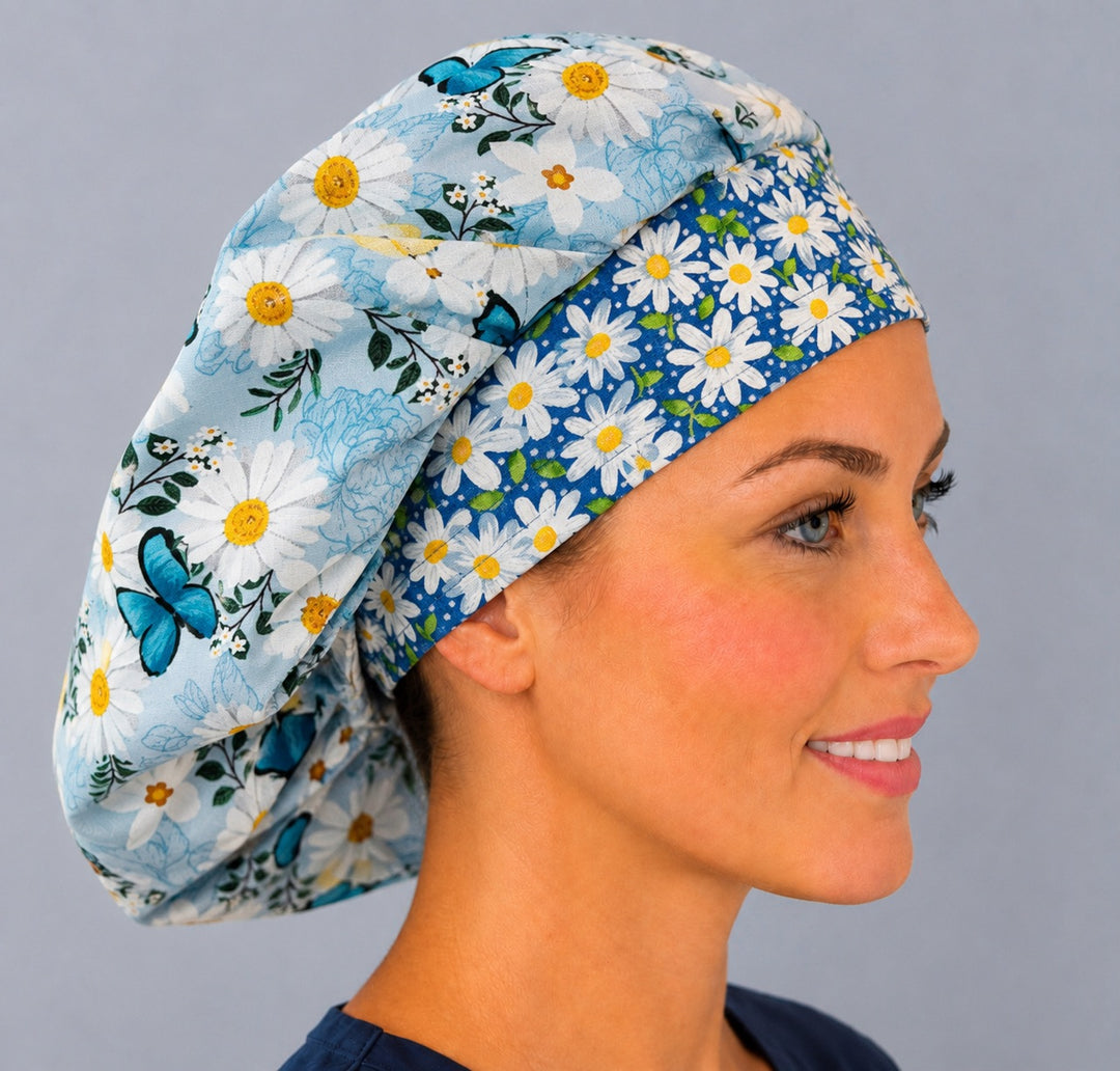 Side view of the blue daisy butterfly bouffant surgical cap — navy daisy band and floral print, breathable cotton cap for OR nurses