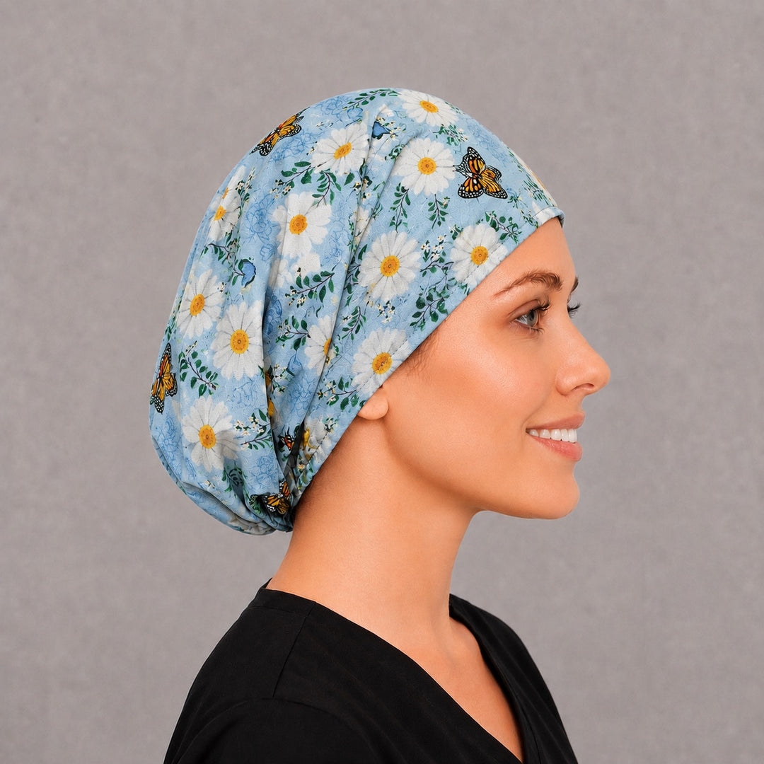 Right side profile of the blue daisy monarch Euro surgical hat — spring floral print, breathable cotton cap for OR nurses
