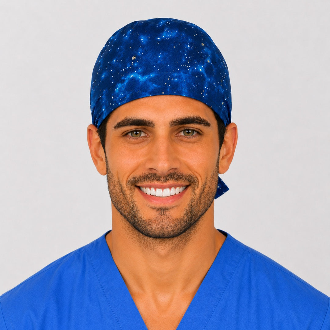 Blue galaxy scrub cap front view on a man — starry night sky print with stars and nebula, cotton tie-back surgical cap for nurses