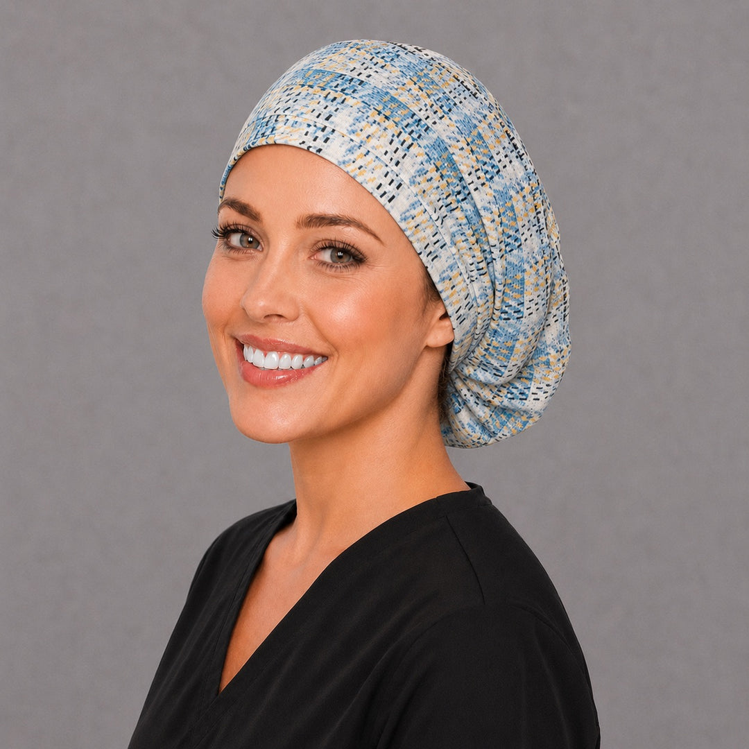 Blue and gold plaid Euro surgical hat, right angled smiling view — handmade neutral plaid cap, USA made
