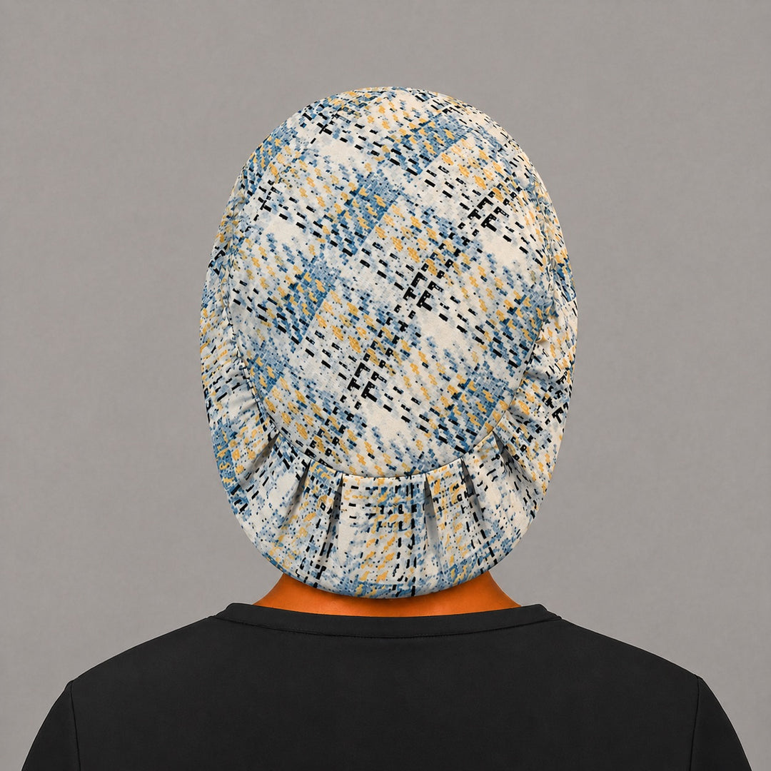 Back view of the blue plaid Euro scrub cap — elastic gathered back showing the blue and gold plaid across the crown