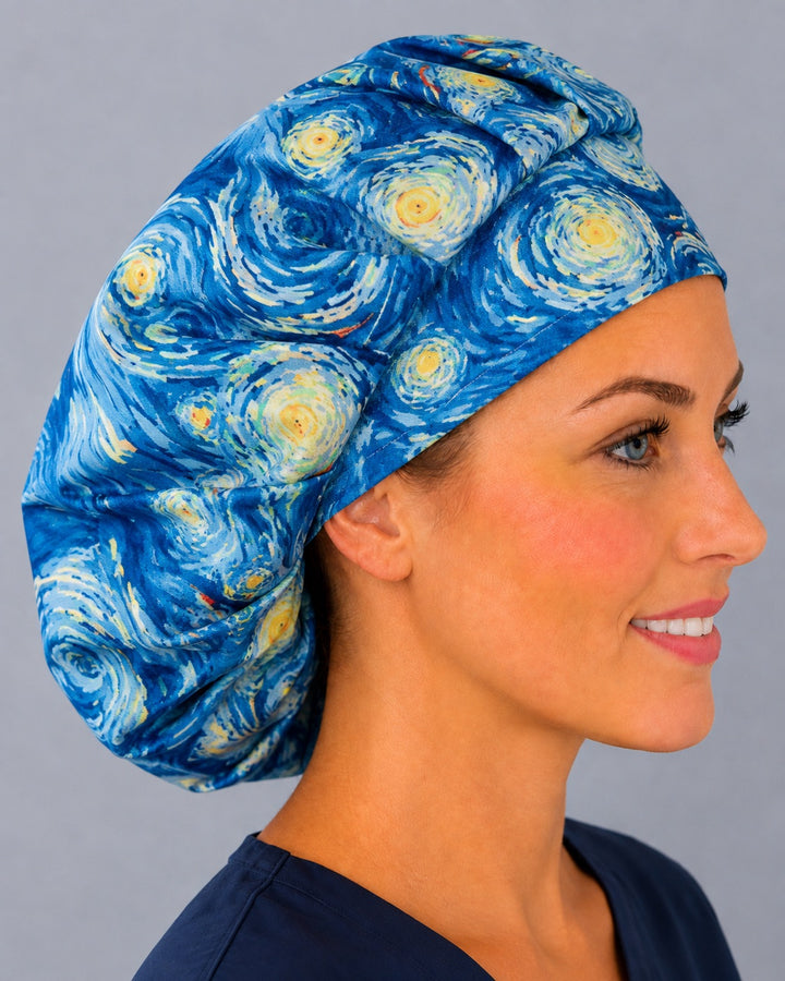 Blue star and swirl bouffant scrub cap, right angled smiling view — glowing golden stars print for OR nurses and surgical techs