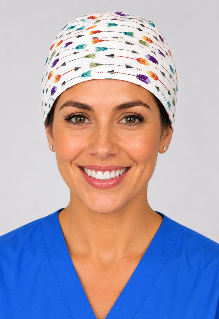 Boho arrow print surgical hat in straight front view, unisex white OR cap sized for short hair