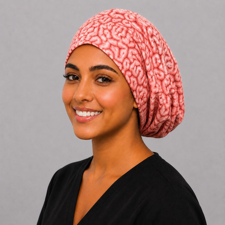 Three quarter smiling view of a brain anatomy euro scrub cap, pink neuroscience print surgical hat for healthcare workers
