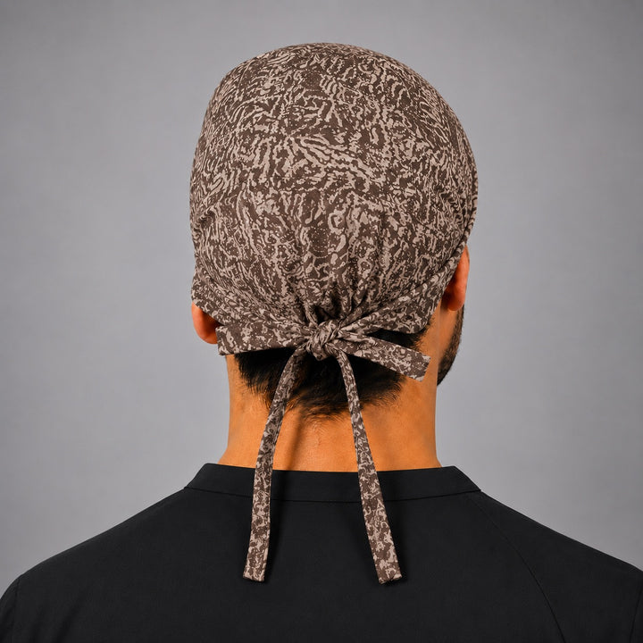 Back view of adjustable tie-back knot on brain anatomy neuro scrub cap surgical hat for men