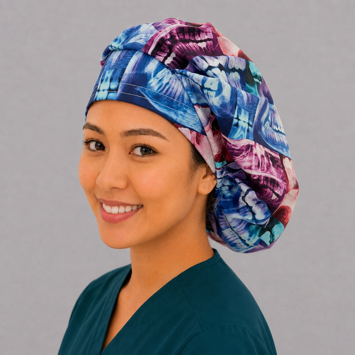 Angled view of a bright dental radiograph bouffant scrub cap on a smiling dental assistant, breathable cotton surgical hat handmade in the USA