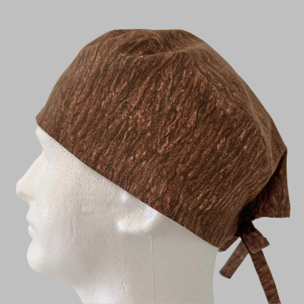 Side view of brown neutral scrub cap — handmade in the USA, adjustable unisex tie-back surgical hat for OR nurses & surgeons.