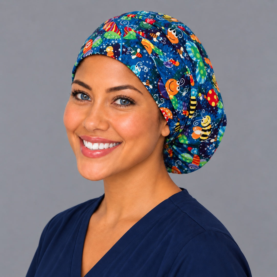 Butterfly and bee Euro scrub cap, right angled smiling view — starry blue print for OR nurses and pediatric teams