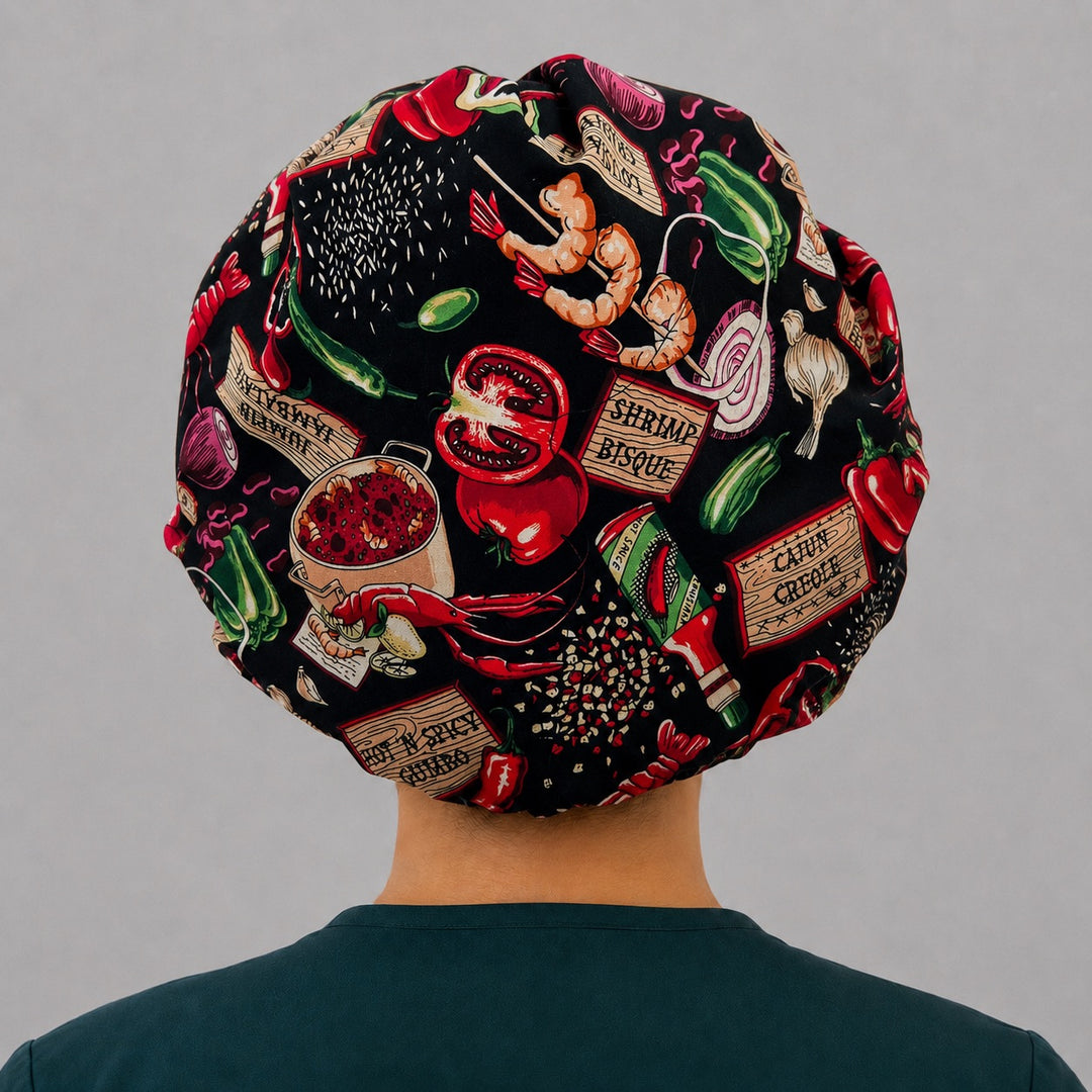 Back view of the Cajun foodie bouffant scrub cap — full roomy fit with crawfish, shrimp, chili peppers and gumbo labels on black