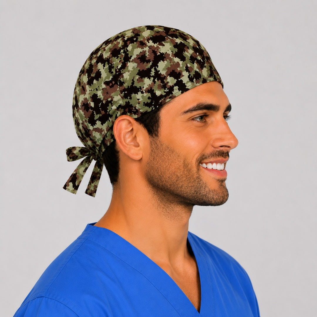 Man wearing a green camouflage tie-back scrub cap, front view — OR World handmade military camo surgical hat