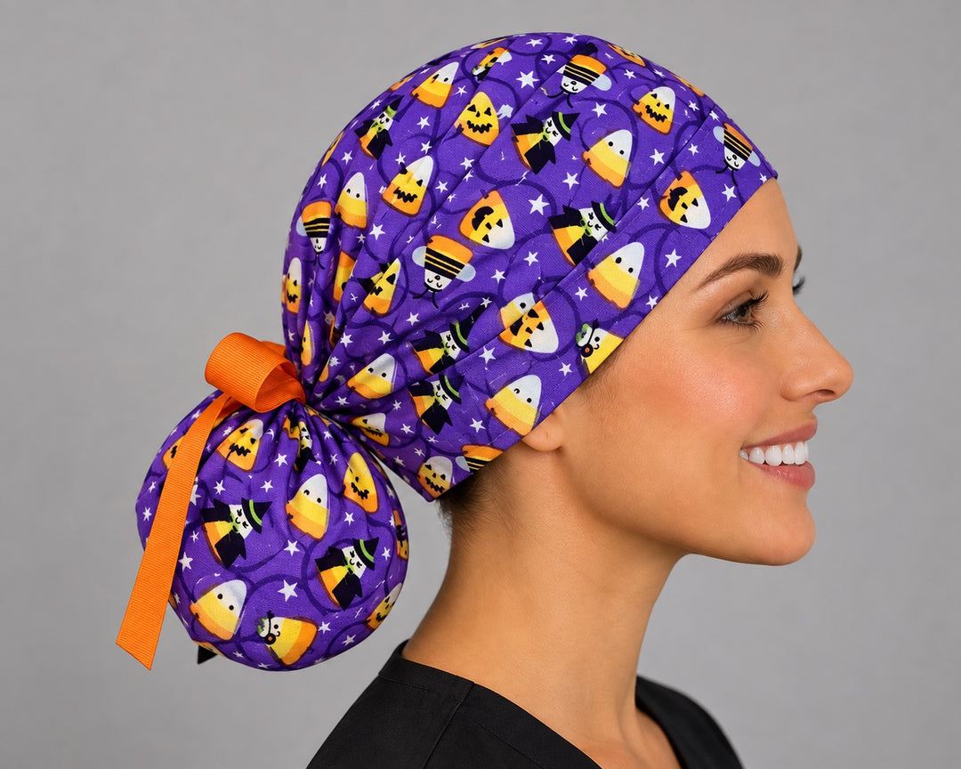 Candy corn witch ponytail cap, left side profile — handmade purple Halloween surgical cap, USA made