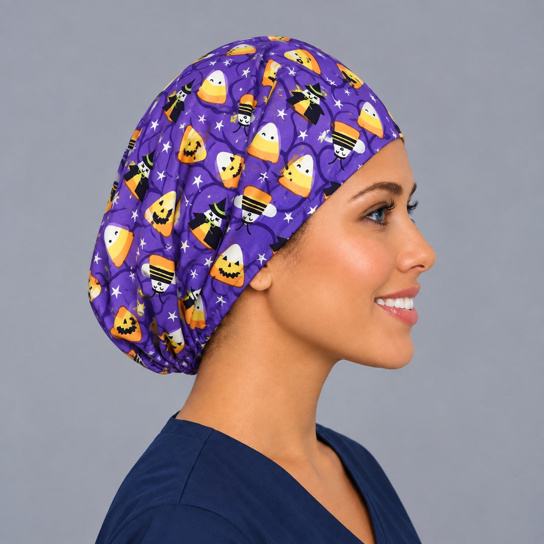 Candy corn witches Euro surgical cap, left side smiling view — elastic adjustable back that secures long or thick hair