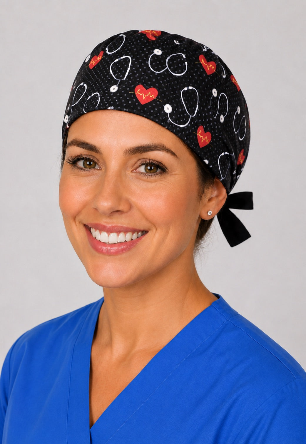 Back view of adjustable tie-back knot on black cardiology heart and stethoscope surgical hat for men