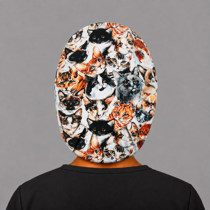 Back view of the Cat Face Euro scrub cap — elastic gathered back showing watercolor cat portraits across the crown