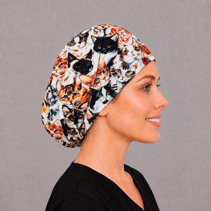Left side profile of the Cat Face Euro surgical cap — tabby and Siamese portraits, breathable cotton cap, USA made