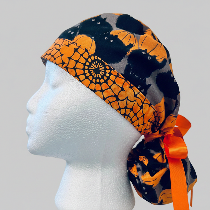 Ponytail Halloween Black Cat &amp; Pumpkin Scrub Cap | Surgical Hat for Long Hair | Adjustable OR Cap for Nurses &amp; Surgeons | Satin Lining Option