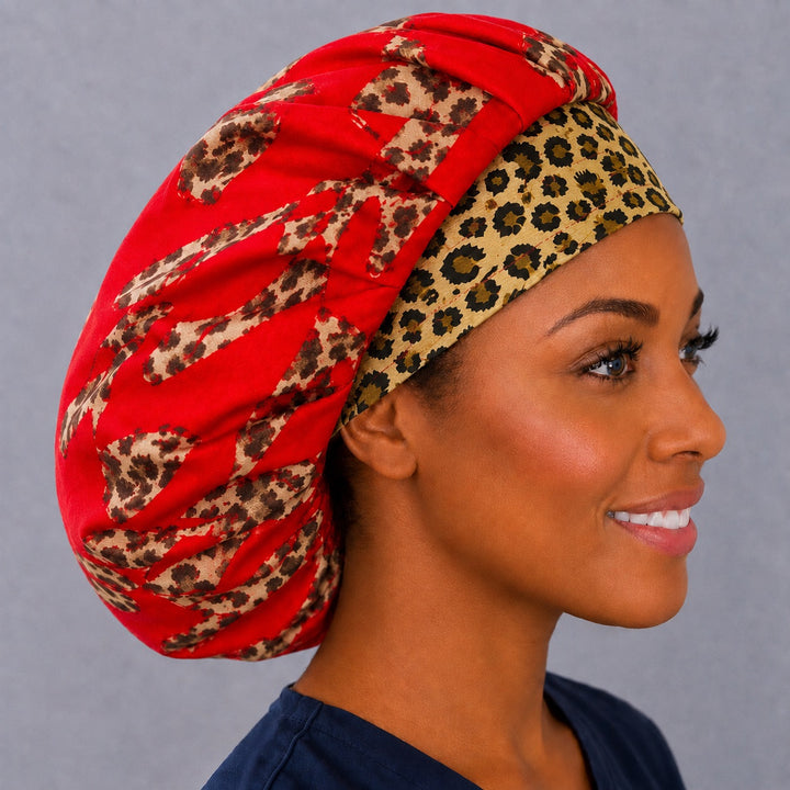 Right side profile of the cheetah band leopard bouffant surgical hat — red heart crown with tan leopard band, roomy breathable cotton cap for nurses