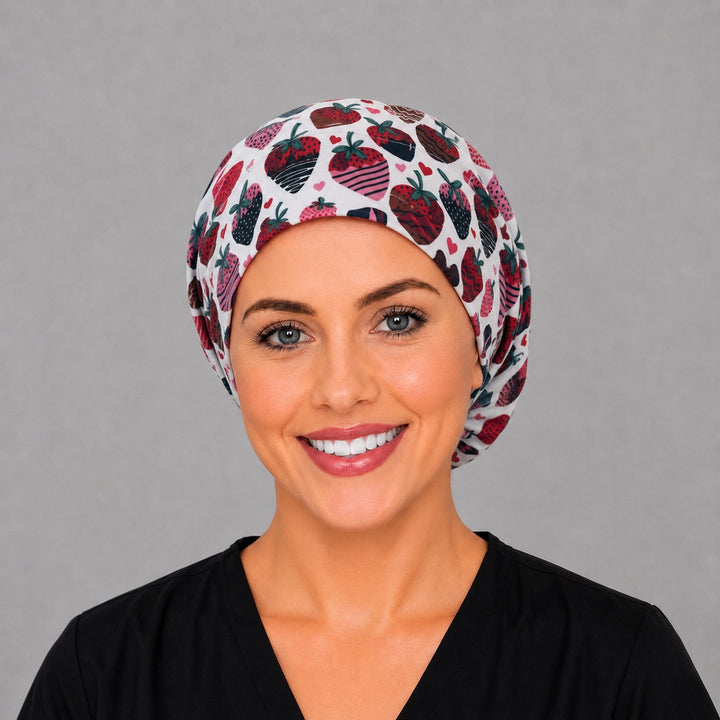 Chocolate-dipped strawberry Euro scrub cap, left side profile — breathable cotton cap with full head coverage