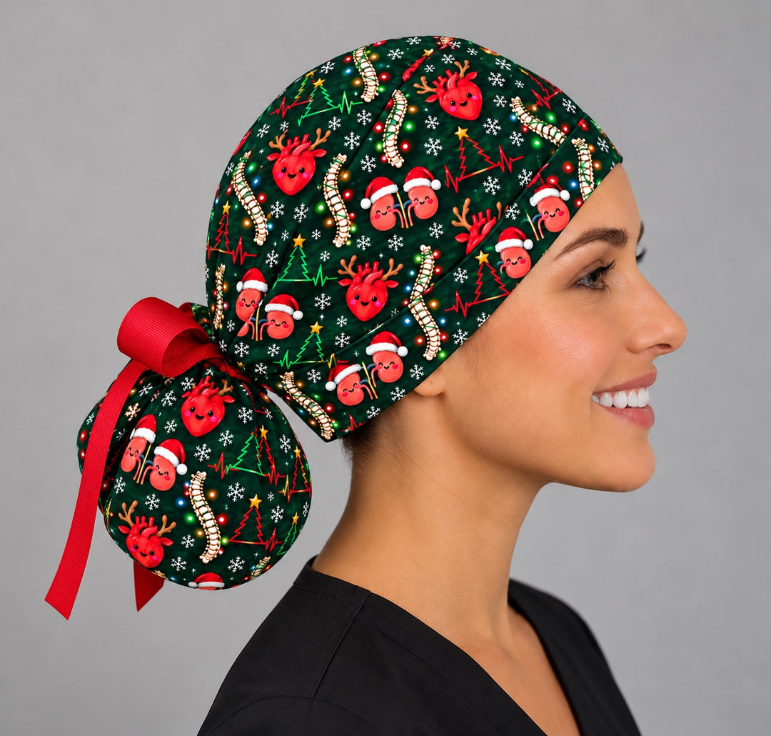 Right profile of a Christmas anatomy ponytail surgical hat, showing the rounded ponytail pouch cinched with a long red ribbon