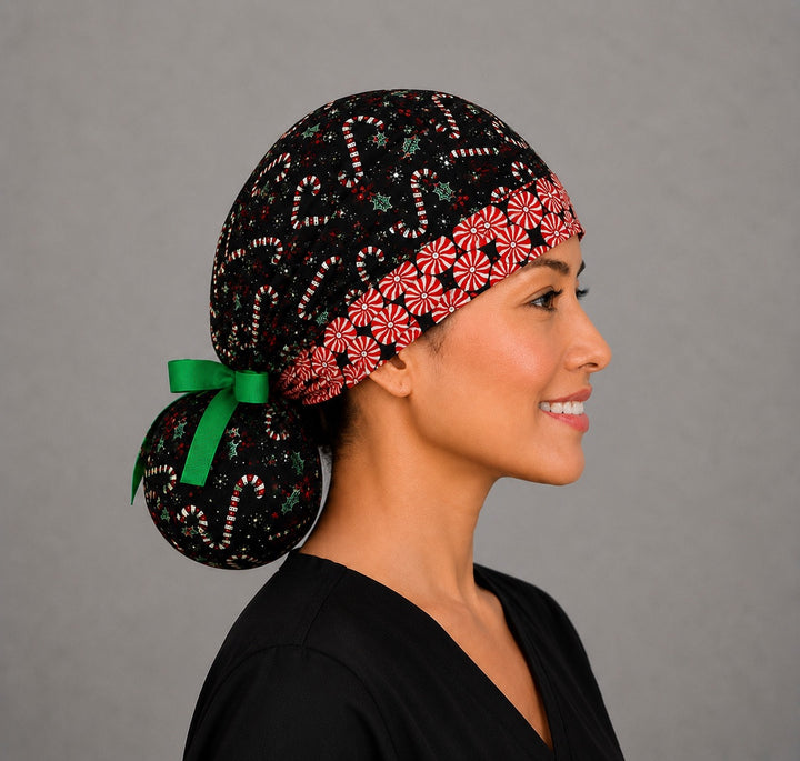 Christmas candy cane peppermint ponytail scrub cap right side profile showing gathered ponytail pouch of candy canes and holly with peppermint band and green ribbon bow