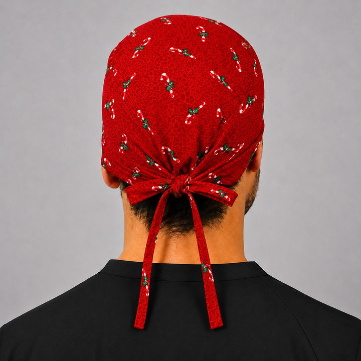 Back view of adjustable tie-back knot on red Christmas candy cane scrub cap surgical hat for men