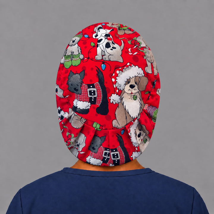 Back view of the Christmas dog Euro scrub cap — elastic gathered back showing Santa puppies across the red crown