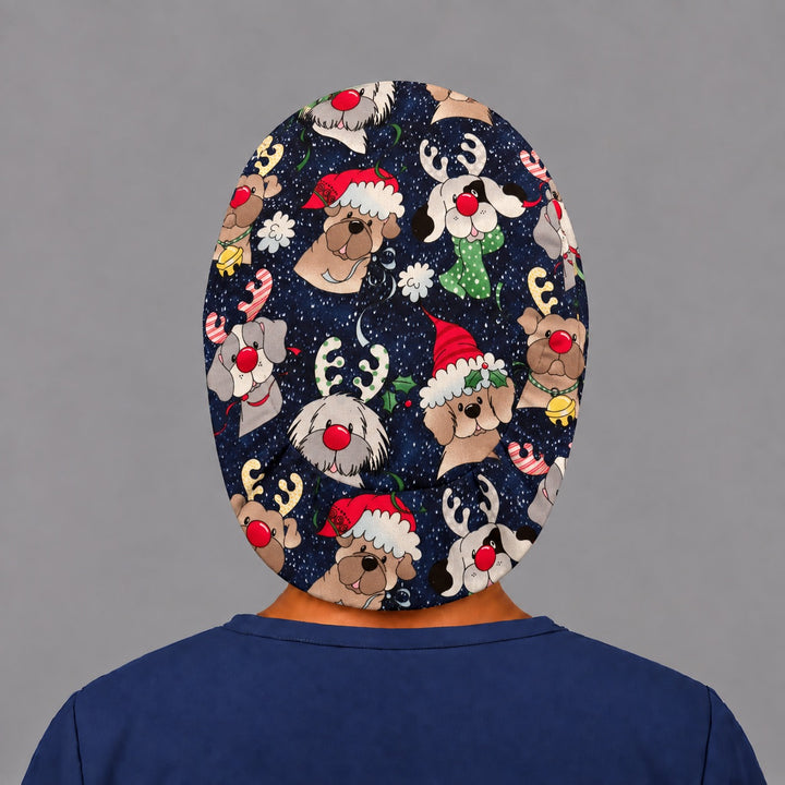 Back view of the Christmas dog Euro scrub cap — elastic gathered back showing Santa and reindeer puppies across the navy crown
