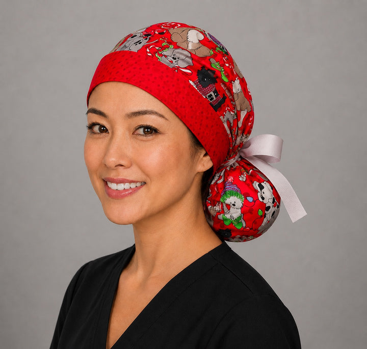 Christmas dogs ponytail nurse cap left three-quarter angle on smiling model showing pups in Santa hats and candy canes on red with red polka-dot band and white ribbon bow