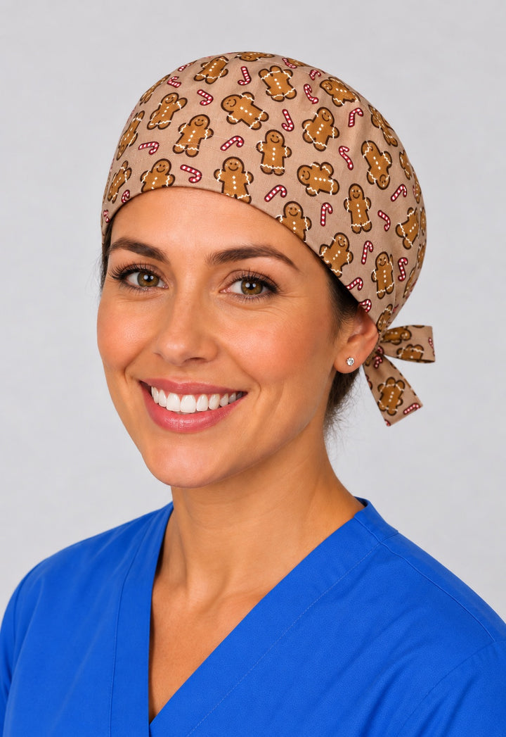 Nurse wearing Christmas gingerbread cookie tie back scrub cap, tan holiday surgical hat with side tie by OR World