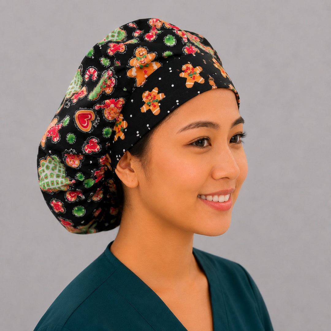 Christmas gingerbread man bouffant scrub cap front view on smiling model showing gingerbread men band, candy canes and cookies on black, women&