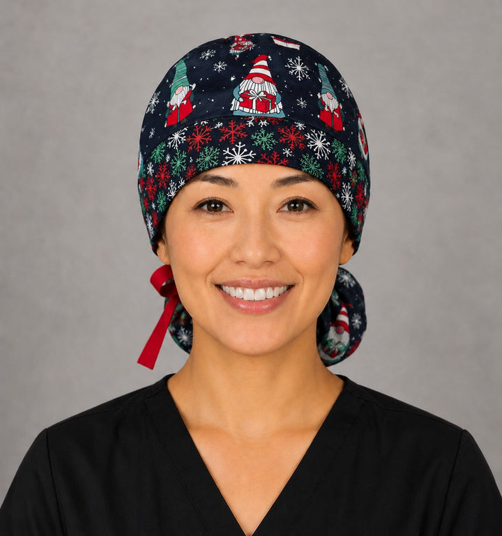 Christmas gnomes ponytail nurse cap left three-quarter angle on smiling model showing holiday gnomes, ornaments and snowflake band with red ribbon bow