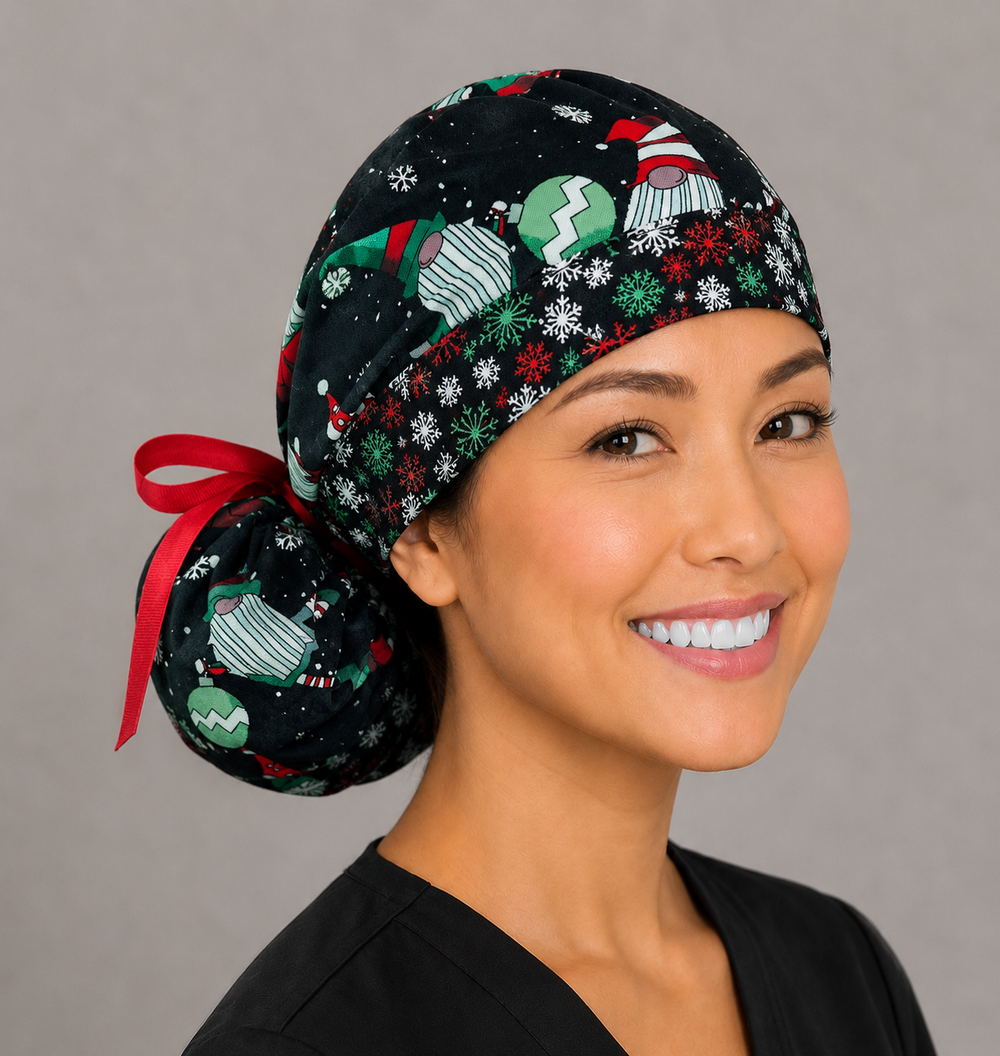 Christmas gnomes ponytail surgical cap right three-quarter angle showing holiday gnomes, ornaments and snowflakes on black with snowflake band and red ribbon bow