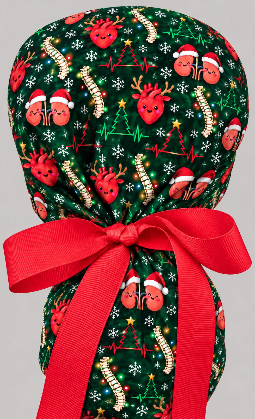 Back close-up of a Christmas ponytail surgical cap, with full rear coverage gathered into a red grosgrain bow above the ponytail pouch